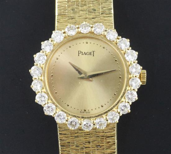 A ladys 1980s 18ct gold and diamond Piaget manual wind wrist watch, with Piaget box.